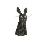 Animal figurines with black and white patterns, several versions