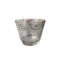 Glass-shaped candle cup with decorations